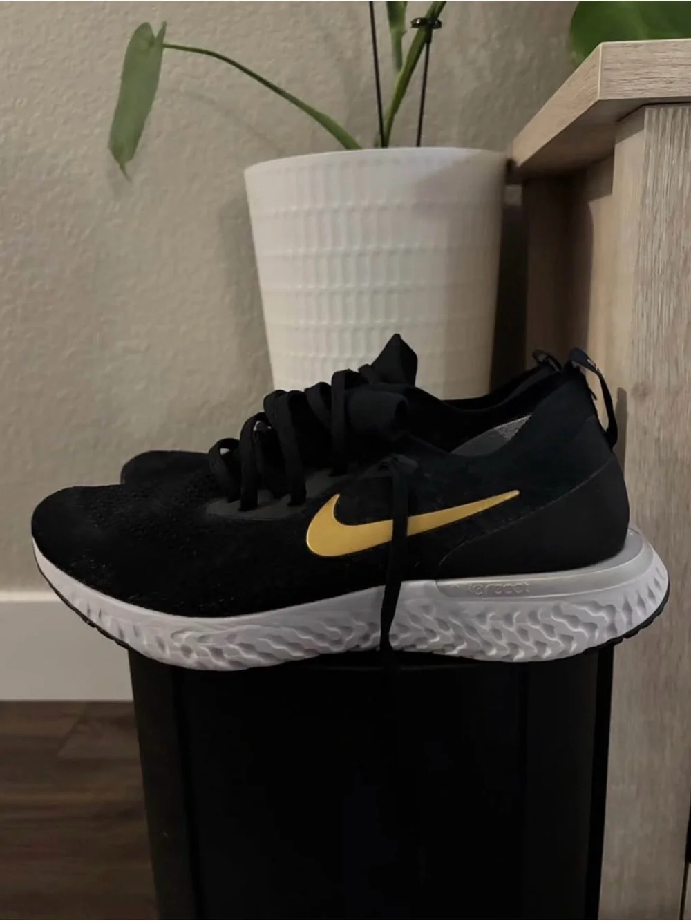 Nike Epic React Flyknit Sneakers Metallic Gold Swoosh